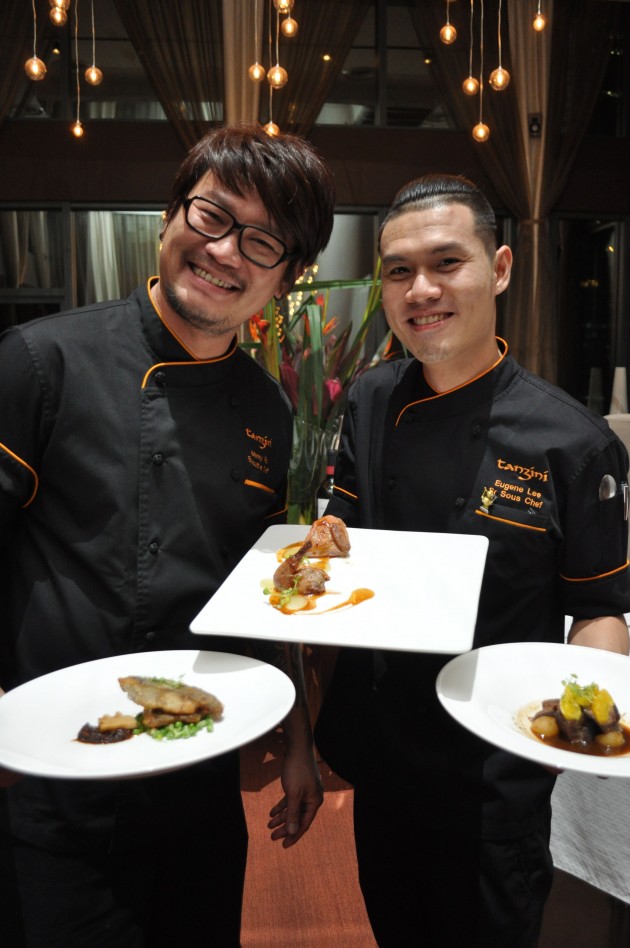 Fua (left) and Lee presenting some of the main courses from the new menu.