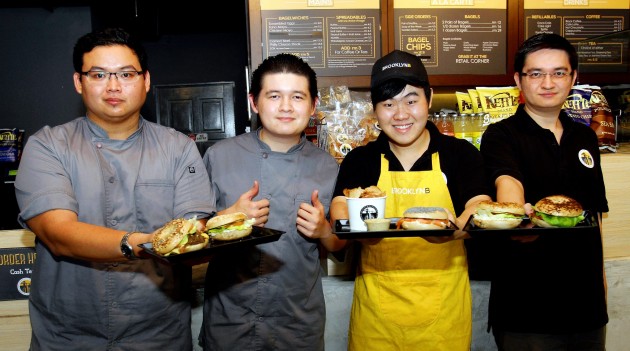 (From left) Darren, Christopher, Hwang and Alexander learnt the art of making bagels from an African who had worked in several bakeries in the US.