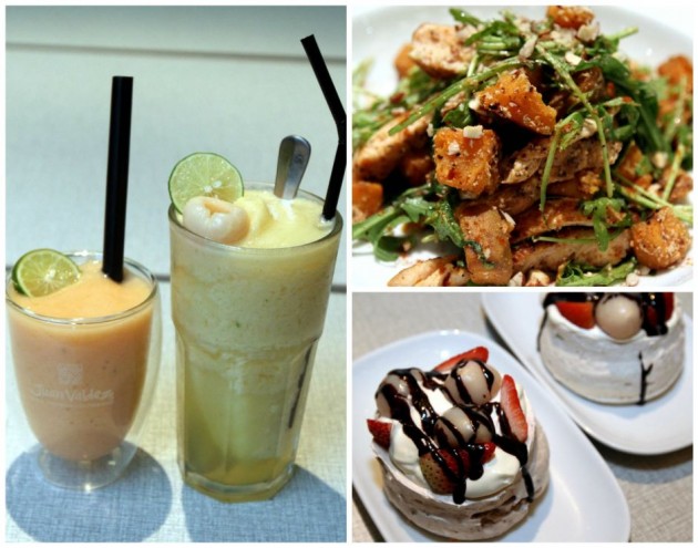 Clockwise from left: Delicious' Papaya and Honey Yoghurt Crush (left) and ice blended Tropical Ice Blast; paprika chicken salad; and Strawberry, Hazelnut and Lychee Pavlova with Chocolate Sauce. – Photos LOW BOON TAT/The Star