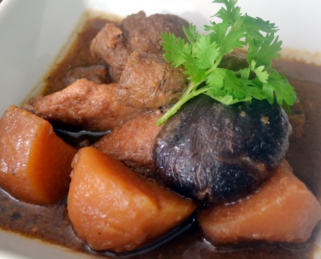 Ayam Pongteh: Traditional Nyonya stew with chicken, potatoes, and soy bean paste gravy.