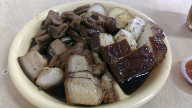 Braised pork belly, tofu, egg and pig's entrails.