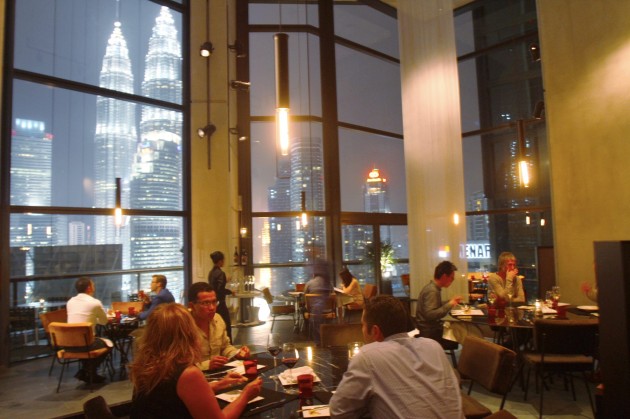 Cantaloupe overlooks the Petronas Twin Towers.