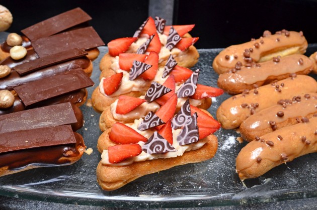(From L to R) Chocolate, Strawberry and Caramel Eclairs, beckon your sweet tooth at the dessert counter.