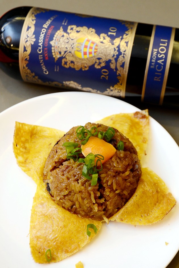 Glutinous rice with salted egg yolk is best paired with red wine Barone Ricasoli Rocca Guicciarda Chianti year 2010 from Italy.
