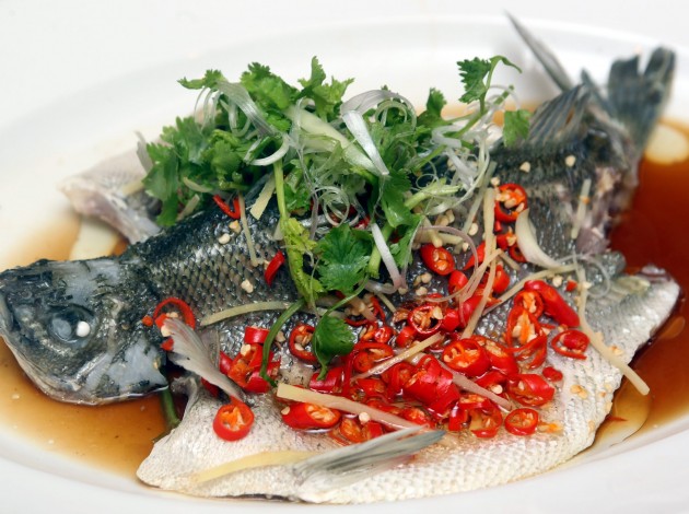 The Jade Perch fish is steamed and sprinkled with cili padi.
