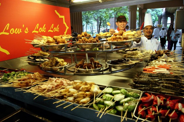 Chefs Low Lam Chong and Zulkifli Mohammad with the wide array of fresh ingredients at Low's Lok-Lok van.