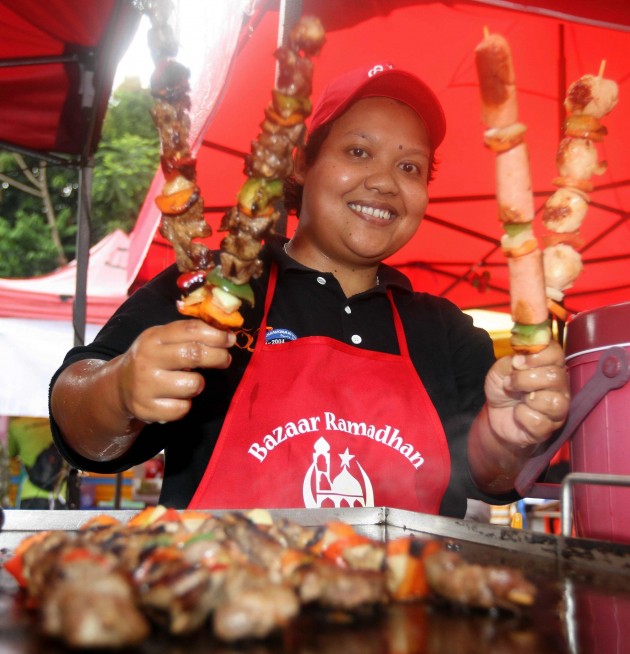 Fazliana Kamam sells skewered lamb, chicken, beef and even salmon at her stall.