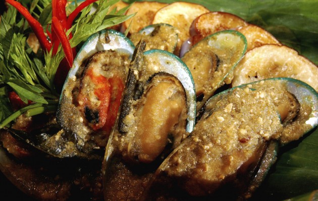 Mussels cooked in a chili and tamarind sauce accompanied with grilled eggplant.