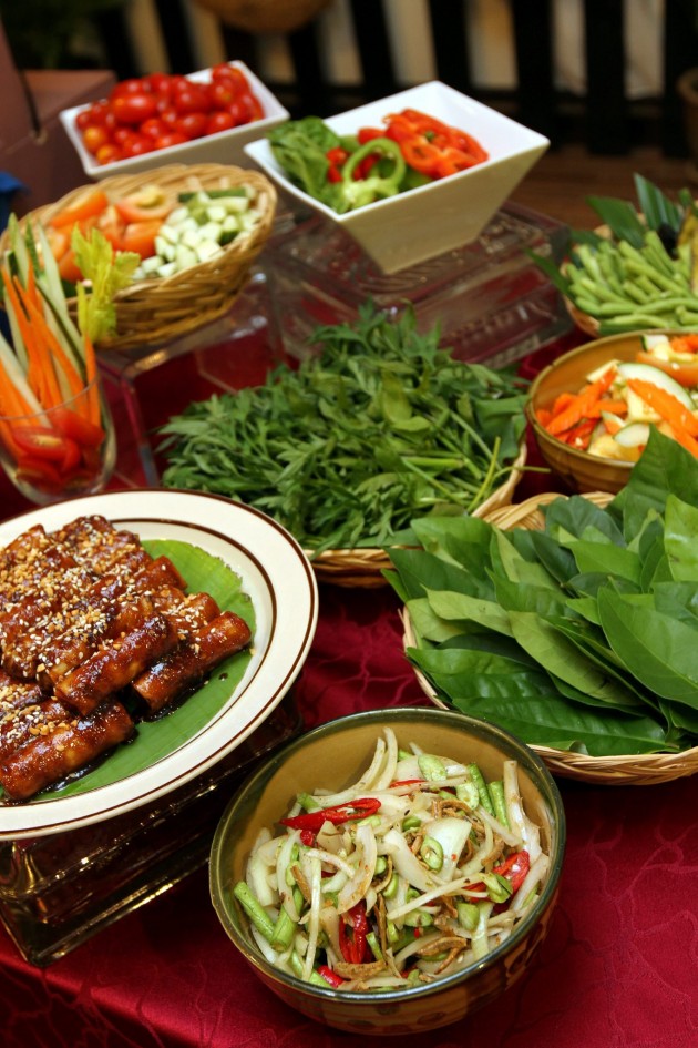 A host of fresh vegetables or ulam-ulam that goes well with a variety of dipping sauces.