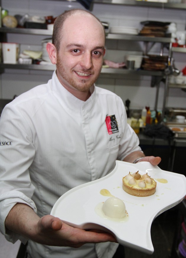 Chef Alexy Fuchs shows off the Warm Lemon Meringue Pie with Lemon Thyme Sorbet.