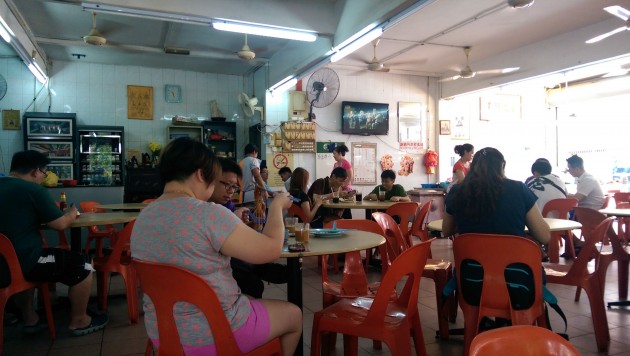 Customers having breakfast at the coffee shop.