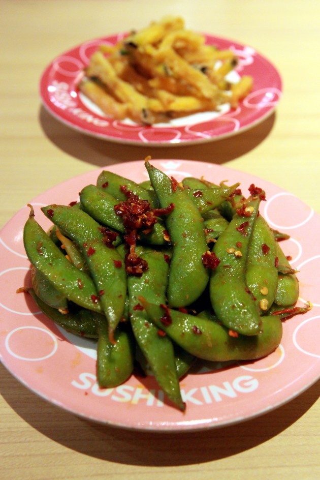 For starters, try the Spicy Edamame (front) and the Pumpkin Tempura.