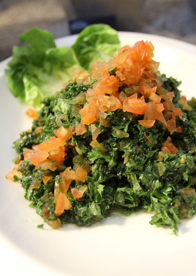 Tabouleh is a famous Middle East salad and tasted a bit sour, perhaps from the tomato and lemon juice.