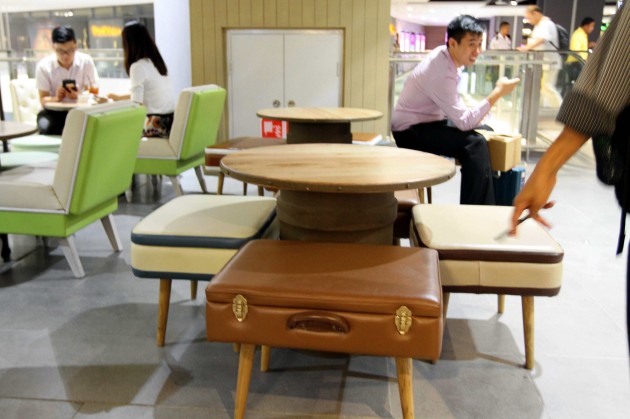 The restaurant features custom-made furniture, produced in Indonesia, that looks like luggage.