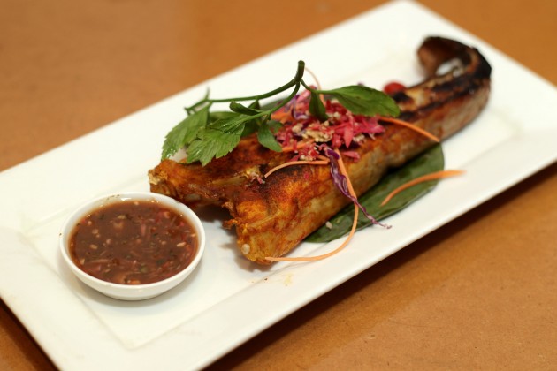 The grilled stingray or Ikan Pari Bakar is best eaten with the tamarind sauce.