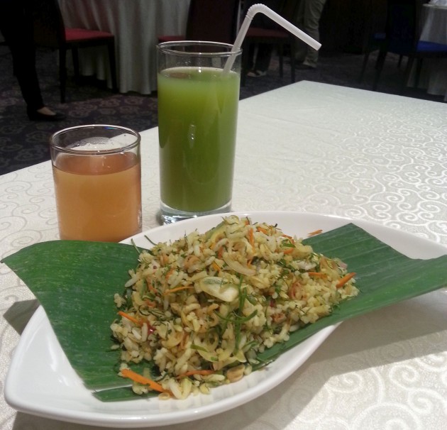 (Drinks from left) The refreshing Lemongrass juice and sourish hot plum juice compliments the Nyonya cuisine well. Seen here is also the Nasi Ulam.
