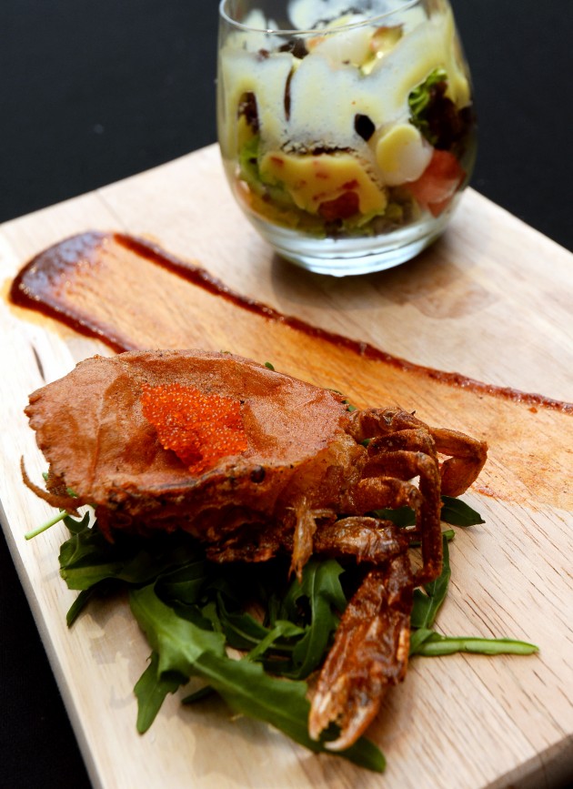 Signature Summer Salad  Soft shell crabs served on a bed of arugula with signature mango summer salad.