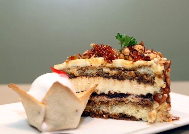 The Tiramisu cake has a rich coat of caramelised almond.