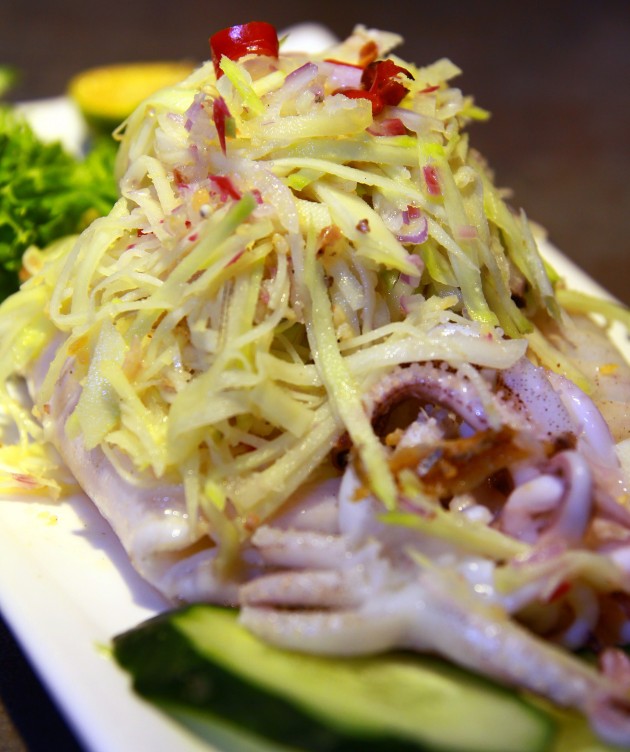 The Grilled Calamari with Mango Salad is a dish familiar to those who enjoy Thai cuisine.