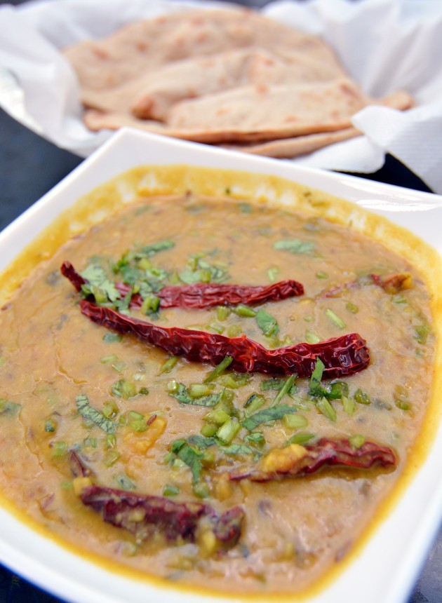 Whole wheat floor bread or tandoor roti and dal tadka yellow lentils curry at Taj Biryani House.