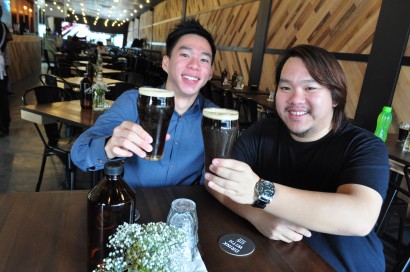 Long, cool one: Kar Weng (left) and Kaw Wai started with carbon dioxide gas at first but changed to nitrogen later when they realised that was what Guinness Stout used to get a good head of foam.