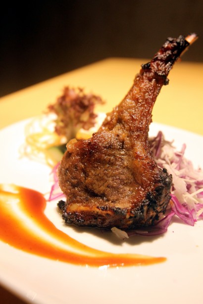 The Mongolian Lamb Rack made with black pepper, soy sauce, tomato sauce and butter.