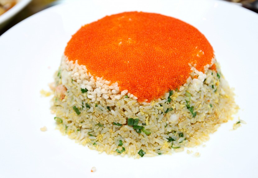 Colourful: The Fried Rice with Seafood and Rice Crackers is topped with crab eggs.