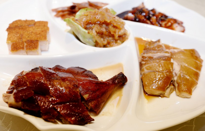 Happiness on a platter: The Six Happiness Platter has jelly fish, roasted pork belly, honey sauce char siew, soya sauce chicken, roast duck and Chinese sausages.