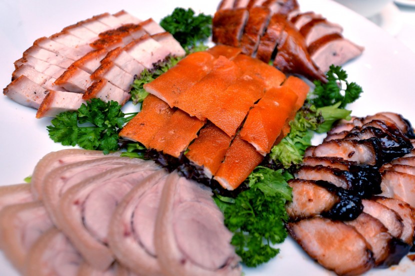 For meat lovers: Five Happiness Assorted BBQ meat dish which comprises thinly sliced poached pork, roasted duck and pork, suckling pig and BBQ pork.