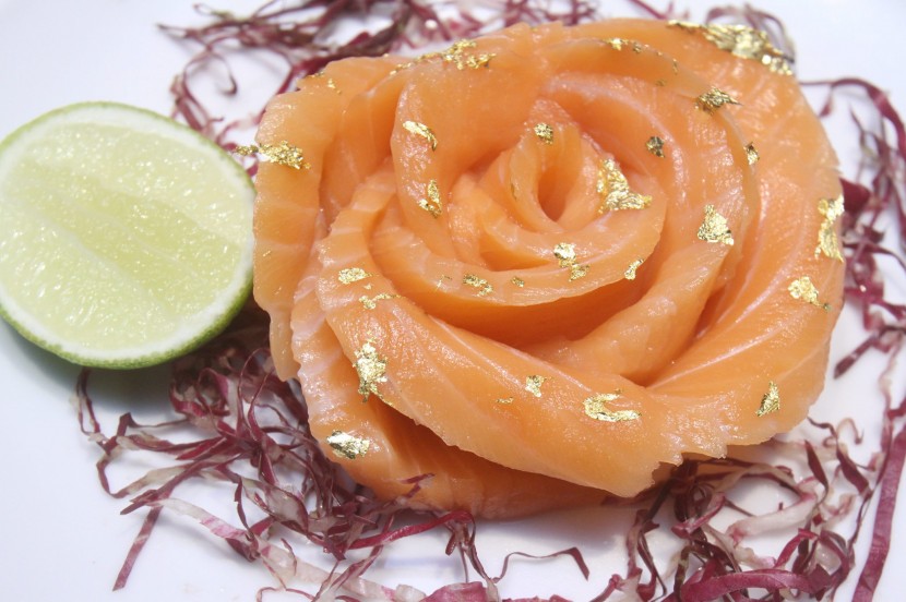 Healthy slices: The rose-shaped salmon slices to add to the Yee Sang.