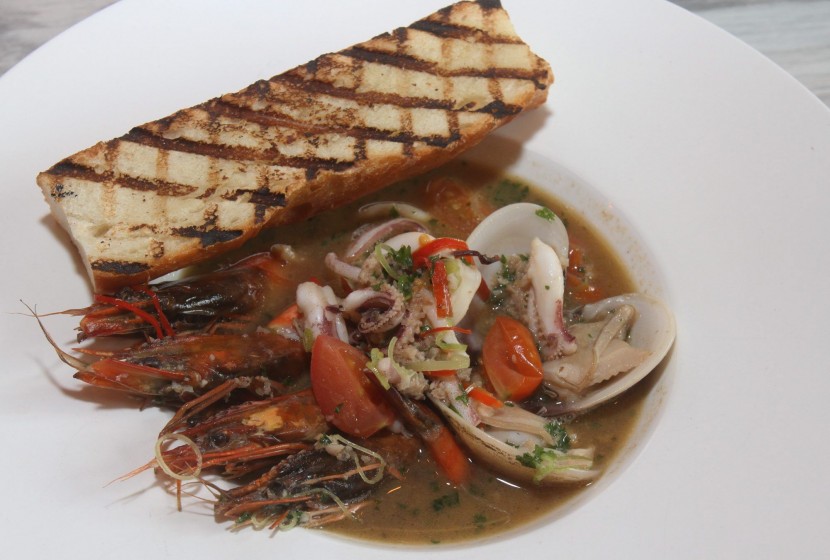 Tasty: Zuppa Di Mare comes with a generous amount of prawns, clam and squid in a light broth with some chilli slices thrown in to suit the local palate. 