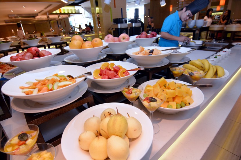An assortment of fruits and desserts including the teppanyaki ice cream which is prepared on a cold plate. 