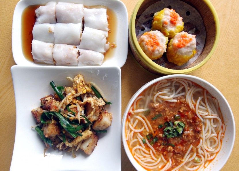 (Clockwise from bottom left) Stir-fried radish cake, prawn rice roll with fried beancurd skin, steamed siew mai and Guilin mee suah.