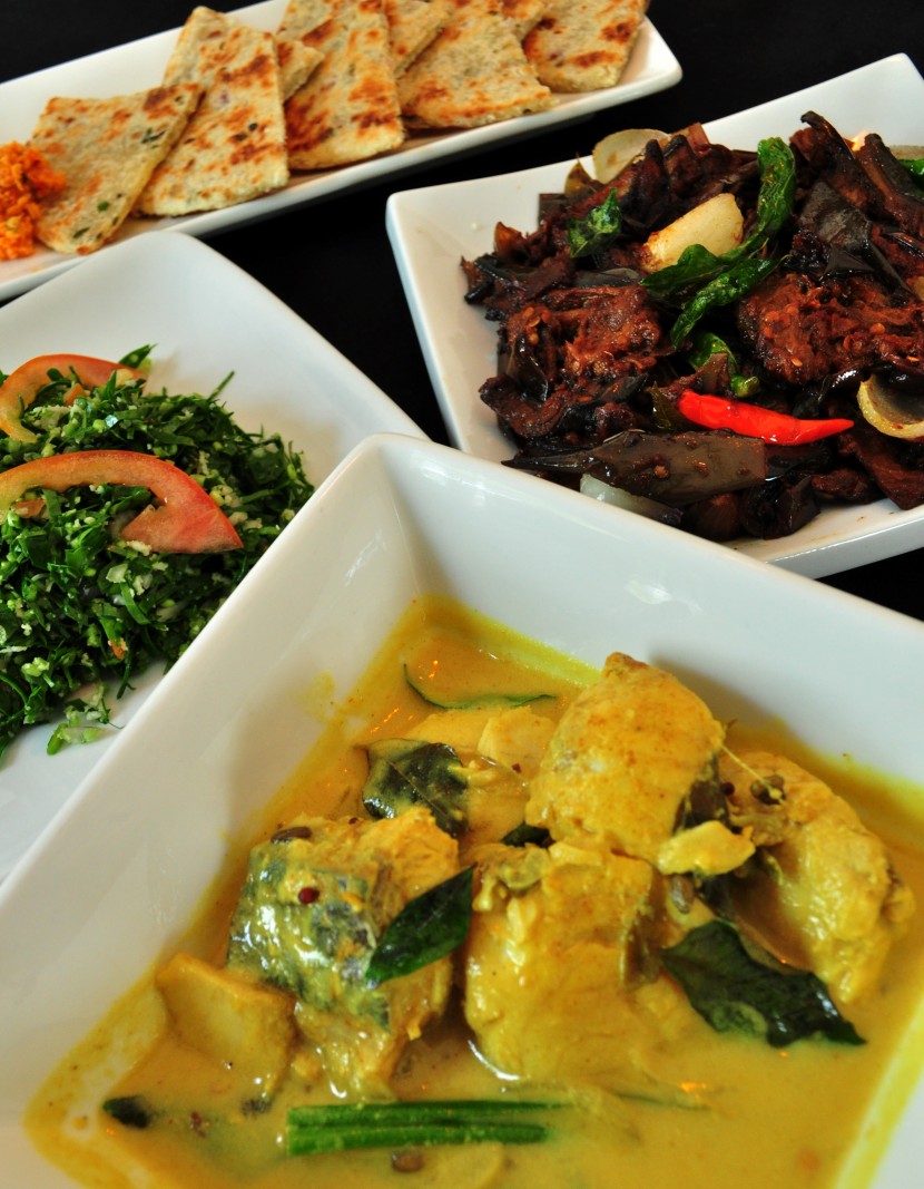 Sri Lankan cuisine (Clockwise from left): Vallarai keerai, brinjal moju and fish sodhi.