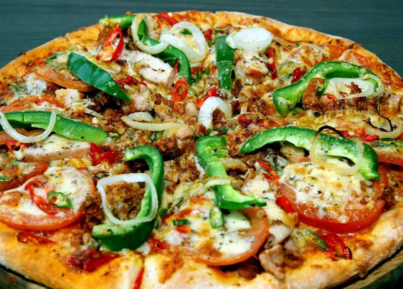 The spicy chicken pizza bursting with peppers and chilli that only inflicts a mild burn. 