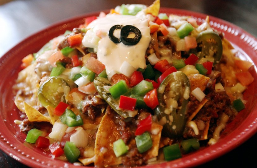 While you wait for your main, order the Muchos - Minced Beef Crisp Tortilla Chips.