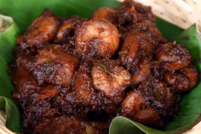 The soy sauce prawns are cooked using a secret recipe concocted by Sanjeevi.