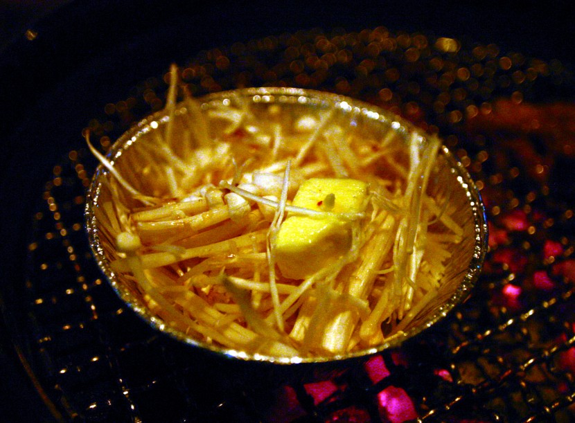 Enoki with butter cooked over a slow charcoal fire is guaranteed to be a hit.