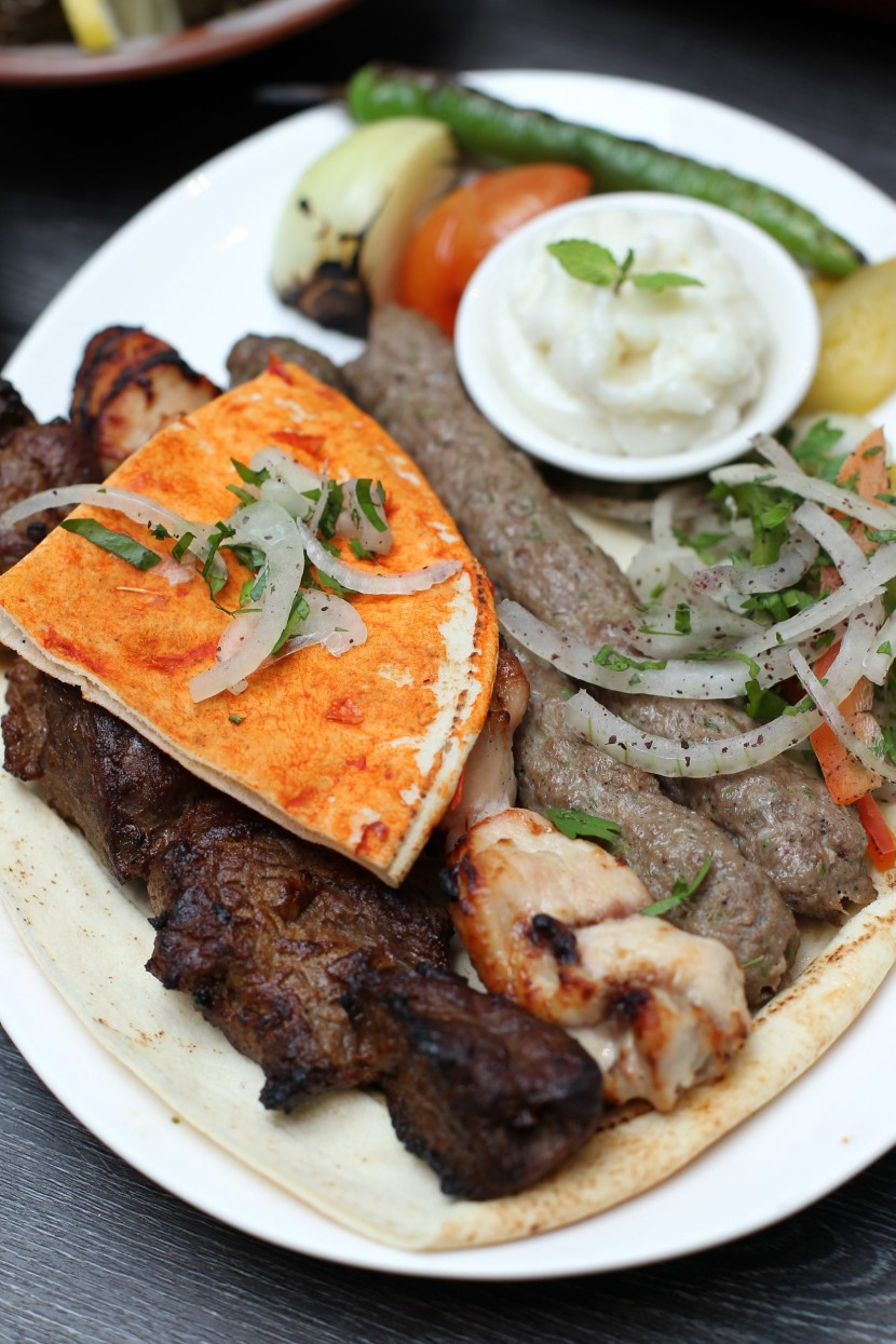 The Mixed Grill platter consisting of lamb, chicken and beef skewers, served with the special garlic paste.