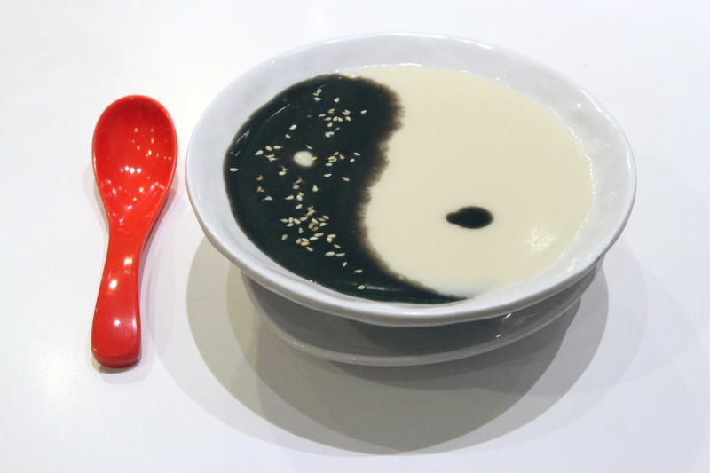 A yin and yang combo of the hot sesame and almond paste dessert.