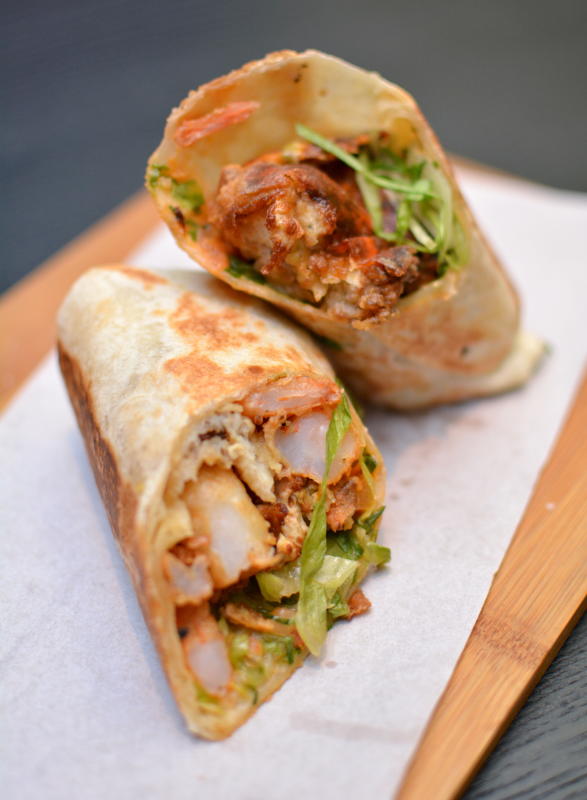 The Black Pearl Burrito is stuffed with prawns, soft shell crab and fish fillets.