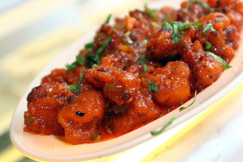 The Gobi Manchurian is basically cauliflower with thick sweet and spicy sauce that can be eaten with rice or with chapati