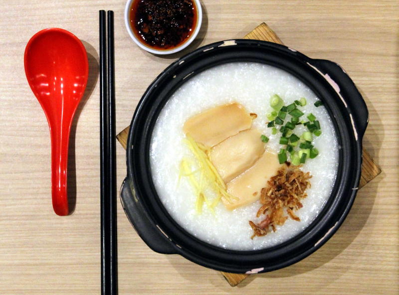 The super-smooth porridge with mock abalone, fish and prawn