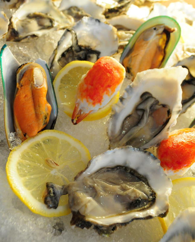 The seafood available at the buffet features fresh oysters, mussels and crab claws.