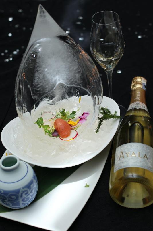 Hokkaido scallops carpaccio with bloody mary sorbet, pickled onion, yuzu dressing and herb salad paired with Ayala Blanc de Blanc 2008.