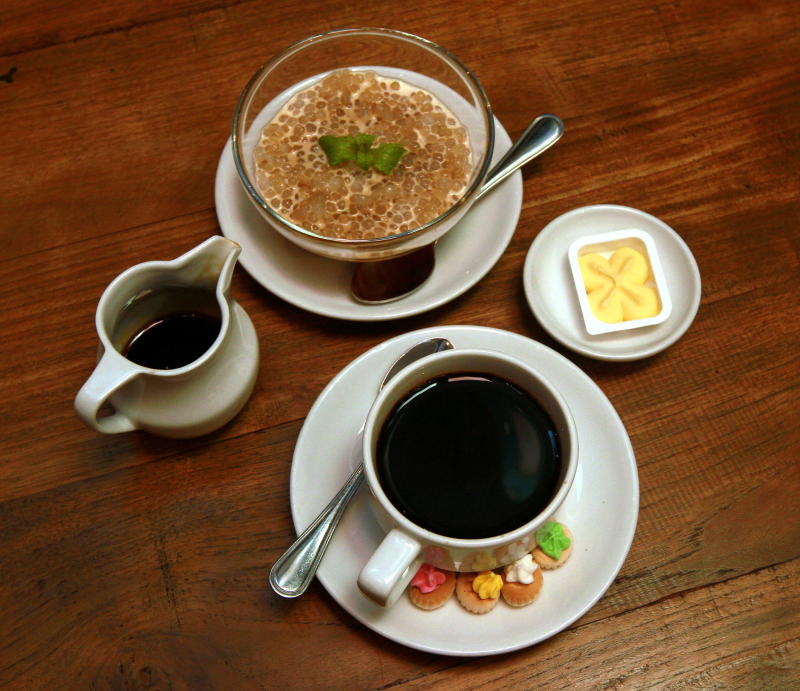 Sago served with santan and gula melaka with the strong black margarine-roasted coffee.