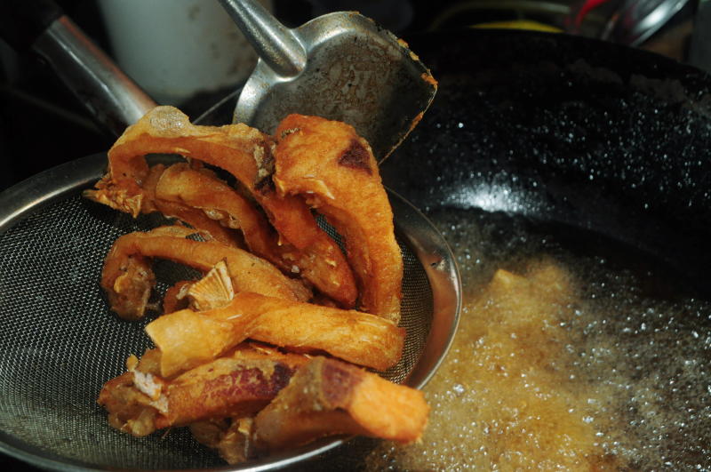 The pieces of fish are first coated in a light batter then freshly fried in small batches.