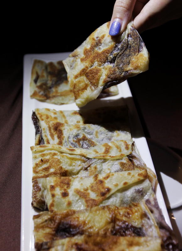 Instead of using crepes or pancakes, their dessert called ChocNaNai, uses roti canai and is filled with chocolate and banana.