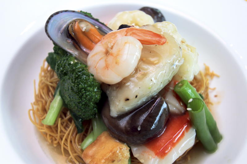 Seafood lovers should try the delicious Cantonese Seafood Noodles.